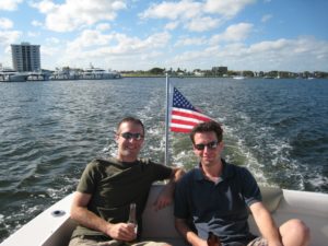 Matt Bitzer and Chris Jones boating on Lake Michigan